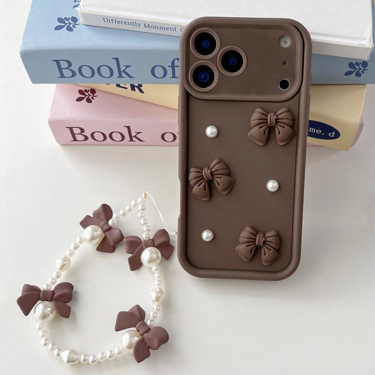 For iPhone 17 Pro Soft Silicone 3D Bowknot Pearl Phone Case with Beaded Wrist Strap(Coffee)